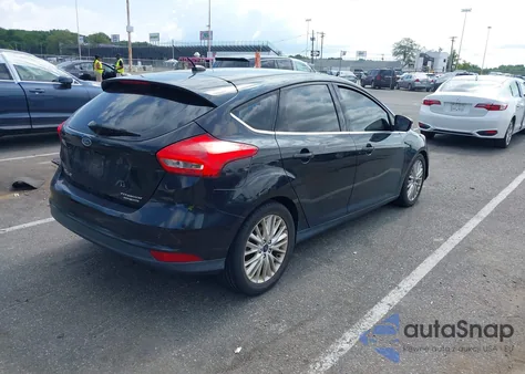 2015 Ford Focus Titanium from USA, damaged, VIN 1FADP3N29FL259950